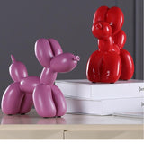 Statue chien ballon rose rouge
