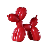 Statue chien ballon rouge